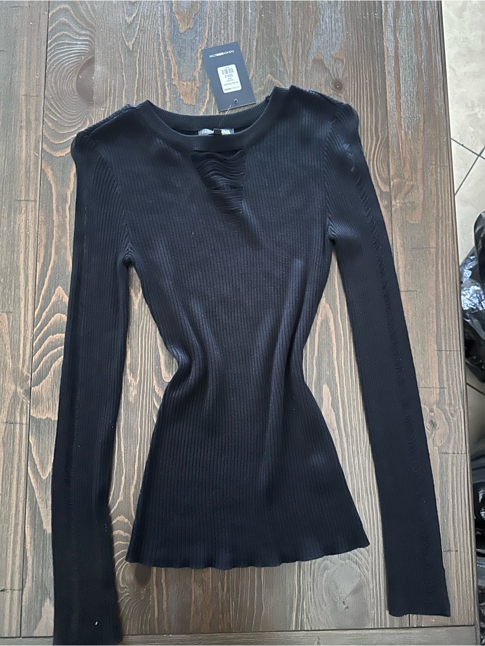 Slim Ribbed Black Long-Sleeve Top with Distressed Neckline
